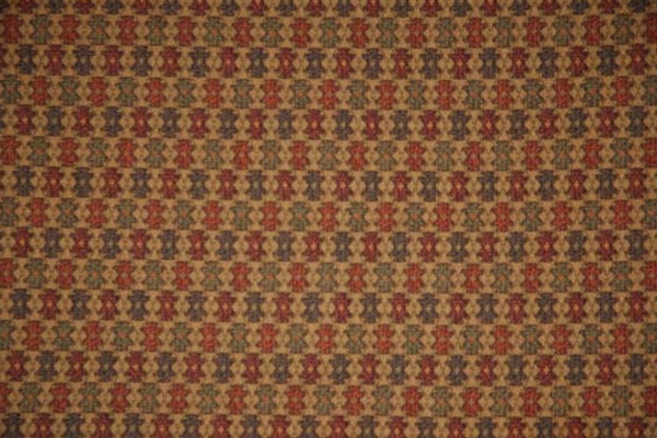 tan and red pattern fabric