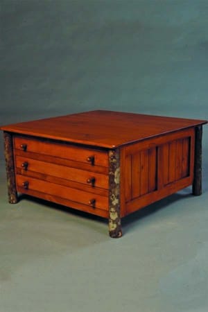 six drawer cocktail table with rustic legs