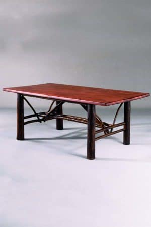 rectangular dining table with dark log legs