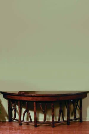 dark wood half circle console table with slingshot accents