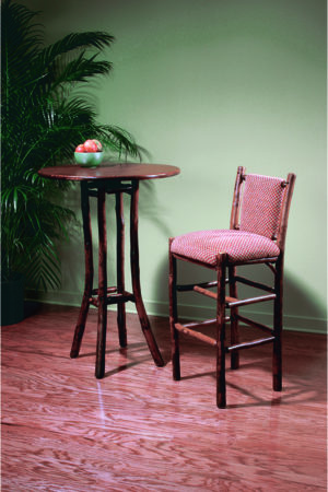 dark wood bar table and bar chair with red checked fabric upholstery