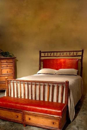 slingshot upholstered bed with pole and slingshot accents and leather upholstered headboard