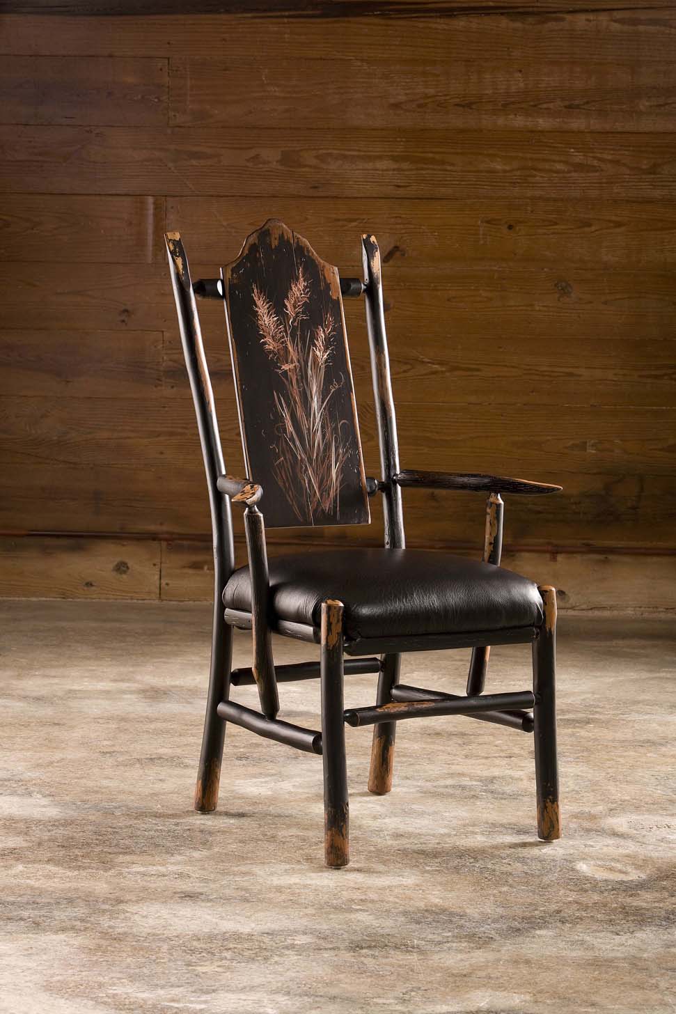 cherry branch arm chair with carved back and leather seat