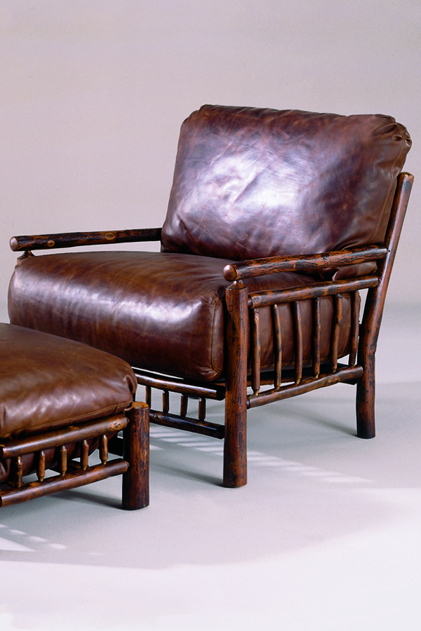 club chair with dark brown leather upholstery
