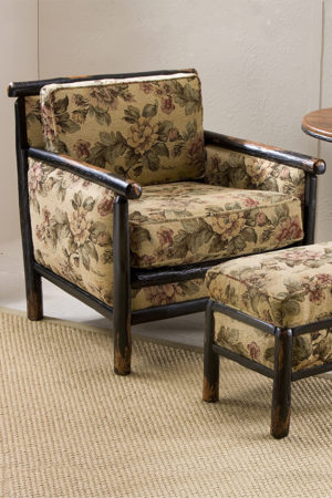 belaire chair with dark wood and tan floral upholstery