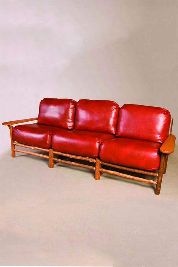 slingshot three person sofa with leather cushions