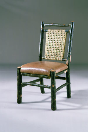 side chair with leather seat and woven caned back