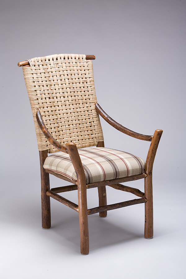 topridge arm chair with plaid fabric seat and woven caned back