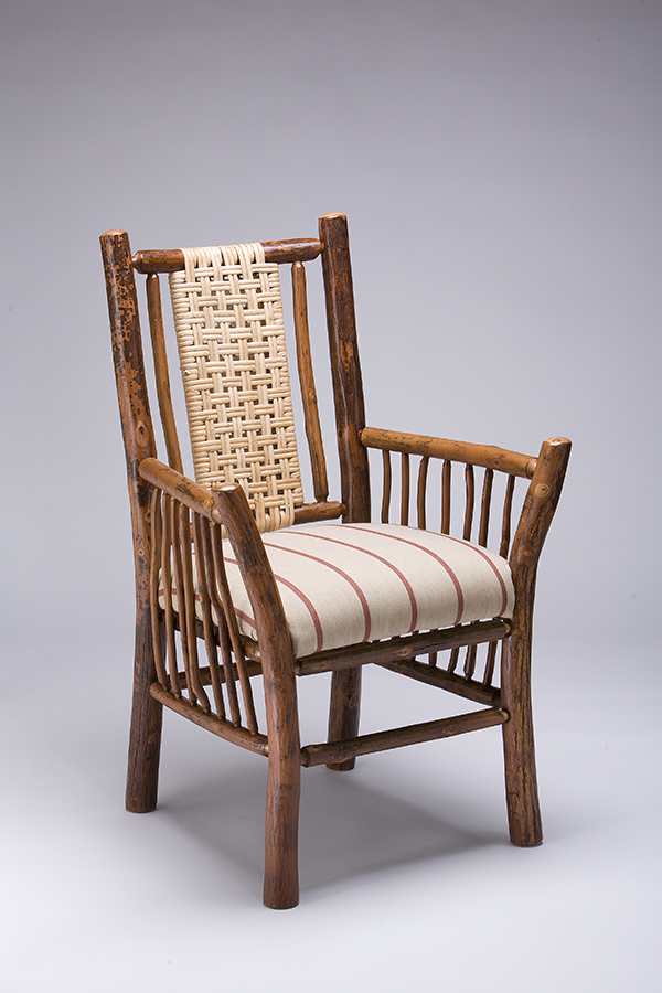 north lake arm chair with red ticking fabric seat and woven caned back