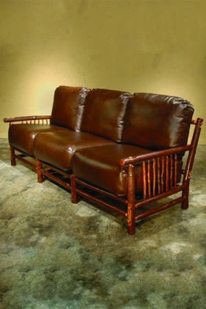 craft sofa for three people with dark leather cushions