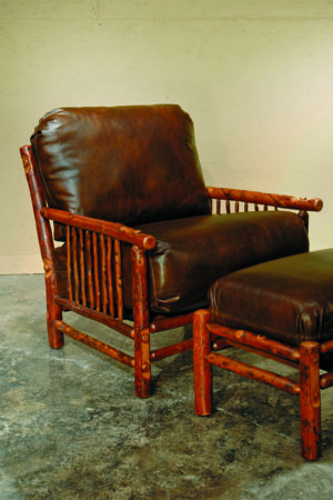 craft lounge chair and ottoman with dark leather upholstery