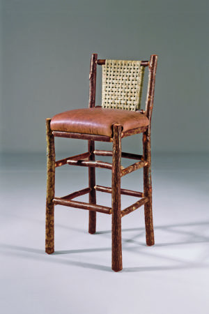 bar chair with leather seat and woven caned back