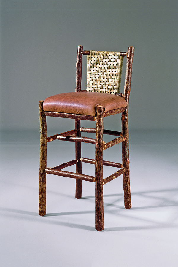bar chair with leather seat and woven caned back