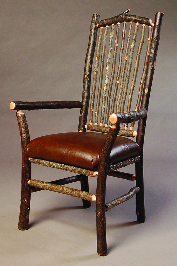 jonas ridge arm chair with pole back and leather seat