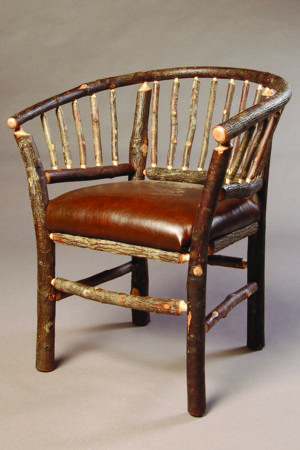 hoop chair with rustic bark log frame and leather seat